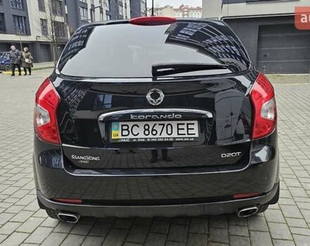 Черный Cанг Йонг Корандо, объемом двигателя 2 л и пробегом 173 тыс. км за 9000 $, фото 7 на Automoto.ua