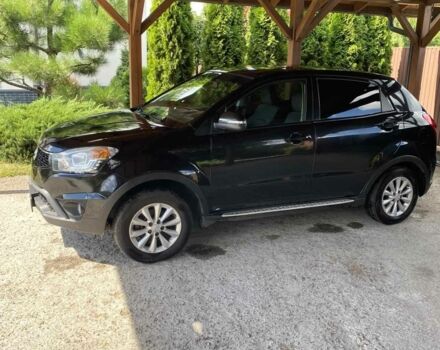 Черный Cанг Йонг Корандо, объемом двигателя 2 л и пробегом 148 тыс. км за 10500 $, фото 5 на Automoto.ua