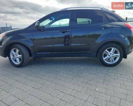 Черный Cанг Йонг Корандо, объемом двигателя 2 л и пробегом 163 тыс. км за 10599 $, фото 8 на Automoto.ua