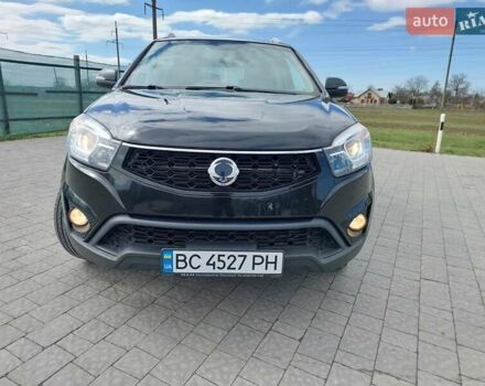 Черный Cанг Йонг Корандо, объемом двигателя 2 л и пробегом 163 тыс. км за 10599 $, фото 1 на Automoto.ua