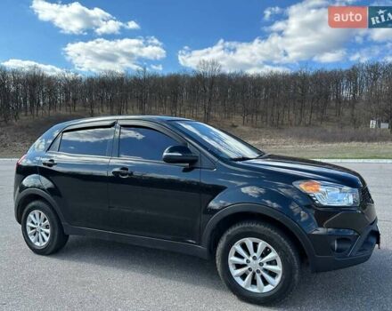 Черный Cанг Йонг Корандо, объемом двигателя 2 л и пробегом 96 тыс. км за 10400 $, фото 4 на Automoto.ua