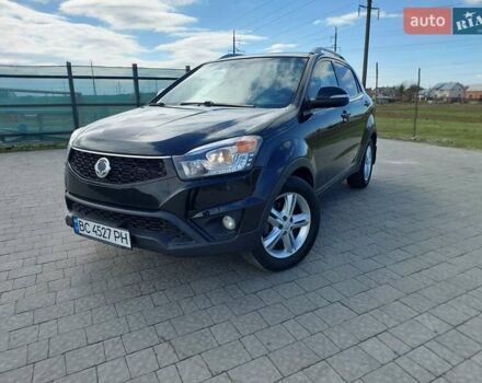 Черный Cанг Йонг Корандо, объемом двигателя 2 л и пробегом 163 тыс. км за 10599 $, фото 10 на Automoto.ua