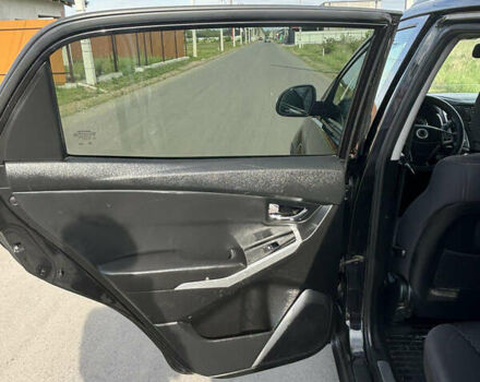 Чорний Cанг Йонг Korando, об'ємом двигуна 2 л та пробігом 229 тис. км за 8199 $, фото 20 на Automoto.ua