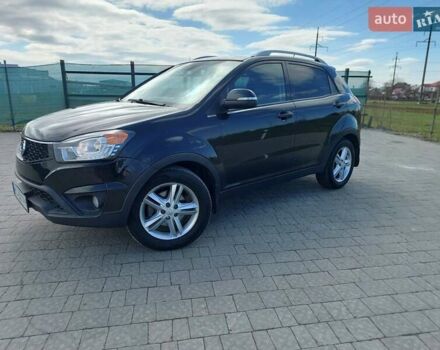 Черный Cанг Йонг Корандо, объемом двигателя 2 л и пробегом 163 тыс. км за 10599 $, фото 9 на Automoto.ua