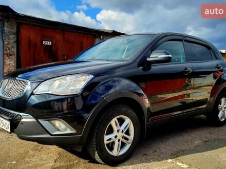 Черный Cанг Йонг Корандо, объемом двигателя 2 л и пробегом 100 тыс. км за 8300 $, фото 1 на Automoto.ua