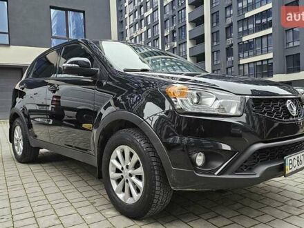 Черный Cанг Йонг Корандо, объемом двигателя 2 л и пробегом 173 тыс. км за 9000 $, фото 1 на Automoto.ua