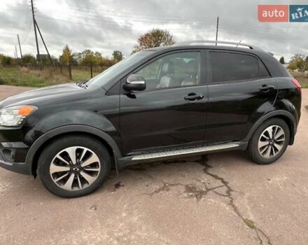 Черный Cанг Йонг Корандо, объемом двигателя 2 л и пробегом 116 тыс. км за 9500 $, фото 1 на Automoto.ua