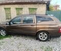 Коричневий Cанг Йонг Korando, об'ємом двигуна 2 л та пробігом 325 тис. км за 5100 $, фото 16 на Automoto.ua