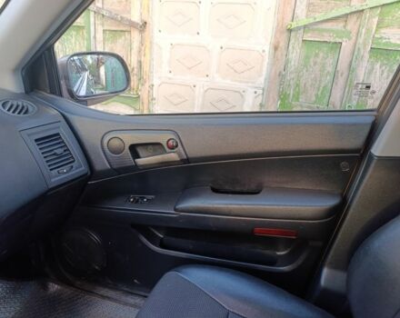 Коричневий Cанг Йонг Korando, об'ємом двигуна 2 л та пробігом 325 тис. км за 5100 $, фото 9 на Automoto.ua