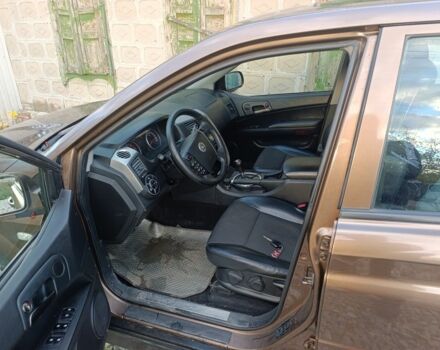 Коричневий Cанг Йонг Korando, об'ємом двигуна 2 л та пробігом 325 тис. км за 5100 $, фото 12 на Automoto.ua