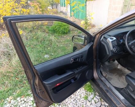 Коричневий Cанг Йонг Korando, об'ємом двигуна 2 л та пробігом 325 тис. км за 5100 $, фото 5 на Automoto.ua