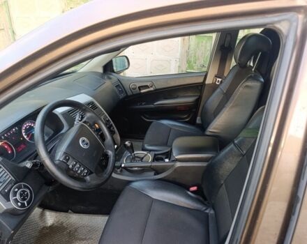 Коричневий Cанг Йонг Korando, об'ємом двигуна 2 л та пробігом 325 тис. км за 5100 $, фото 7 на Automoto.ua