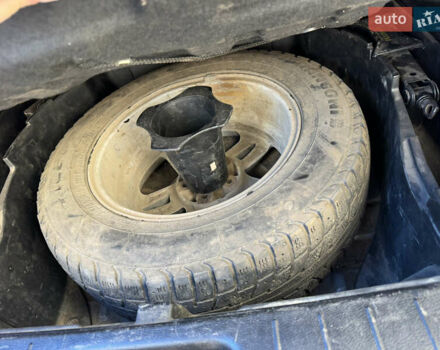 Серый Cанг Йонг Корандо, объемом двигателя 2 л и пробегом 163 тыс. км за 8000 $, фото 32 на Automoto.ua