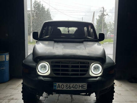 Сірий Cанг Йонг Korando, об'ємом двигуна 2.9 л та пробігом 200 тис. км за 4500 $, фото 1 на Automoto.ua