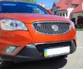 Помаранчевий Cанг Йонг Korando, об'ємом двигуна 2 л та пробігом 124 тис. км за 10990 $, фото 14 на Automoto.ua