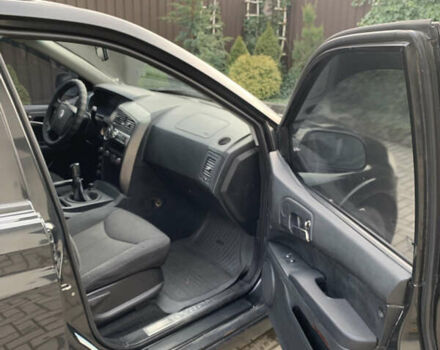 Черный Cанг Йонг Кирон, объемом двигателя 2 л и пробегом 330 тыс. км за 4950 $, фото 10 на Automoto.ua