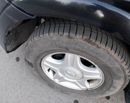 Чорний Cанг Йонг Kyron, об'ємом двигуна 2 л та пробігом 200 тис. км за 4500 $, фото 8 на Automoto.ua