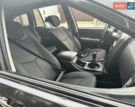 Чорний Cанг Йонг Kyron, об'ємом двигуна 2 л та пробігом 258 тис. км за 7299 $, фото 2 на Automoto.ua