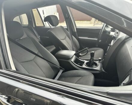 Чорний Cанг Йонг Kyron, об'ємом двигуна 2 л та пробігом 258 тис. км за 7299 $, фото 2 на Automoto.ua