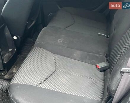 Чорний Cанг Йонг Kyron, об'ємом двигуна 2 л та пробігом 285 тис. км за 4490 $, фото 24 на Automoto.ua