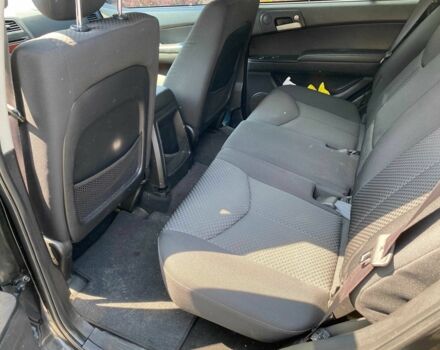 Чорний Cанг Йонг Kyron, об'ємом двигуна 2 л та пробігом 162 тис. км за 7200 $, фото 10 на Automoto.ua