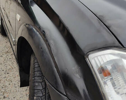 Чорний Cанг Йонг Kyron, об'ємом двигуна 2 л та пробігом 174 тис. км за 7000 $, фото 4 на Automoto.ua