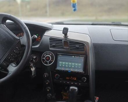 Чорний Cанг Йонг Kyron, об'ємом двигуна 2 л та пробігом 282 тис. км за 6500 $, фото 12 на Automoto.ua