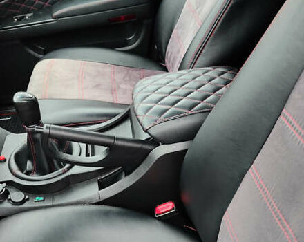 Чорний Cанг Йонг Kyron, об'ємом двигуна 2 л та пробігом 174 тис. км за 7000 $, фото 11 на Automoto.ua