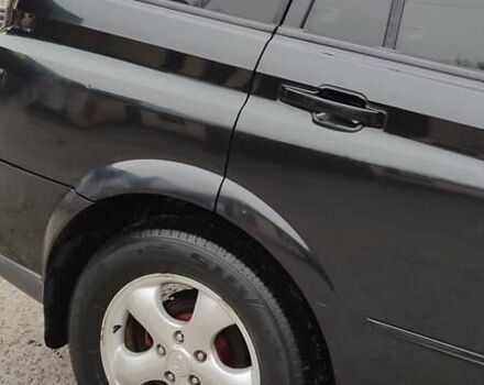 Чорний Cанг Йонг Kyron, об'ємом двигуна 2 л та пробігом 174 тис. км за 7000 $, фото 3 на Automoto.ua