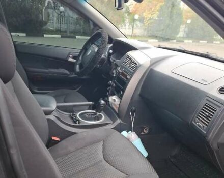 Черный Cанг Йонг Кирон, объемом двигателя 2.3 л и пробегом 200 тыс. км за 6350 $, фото 7 на Automoto.ua