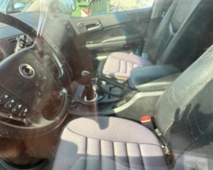 Черный Cанг Йонг Кирон, объемом двигателя 2 л и пробегом 170 тыс. км за 4069 $, фото 5 на Automoto.ua