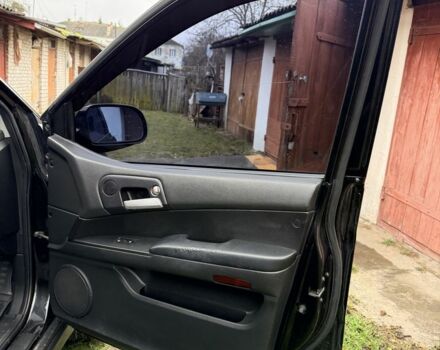 Чорний Cанг Йонг Kyron, об'ємом двигуна 2.3 л та пробігом 113 тис. км за 7500 $, фото 15 на Automoto.ua