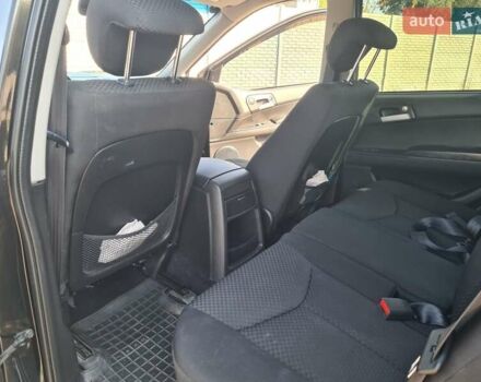 Чорний Cанг Йонг Kyron, об'ємом двигуна 2 л та пробігом 133 тис. км за 10000 $, фото 21 на Automoto.ua