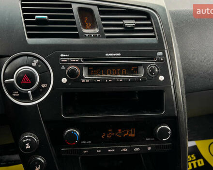 Черный Cанг Йонг Кирон, объемом двигателя 2 л и пробегом 117 тыс. км за 8200 $, фото 13 на Automoto.ua