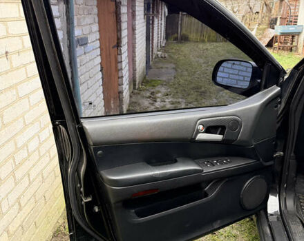 Чорний Cанг Йонг Kyron, об'ємом двигуна 2.3 л та пробігом 113 тис. км за 7500 $, фото 13 на Automoto.ua