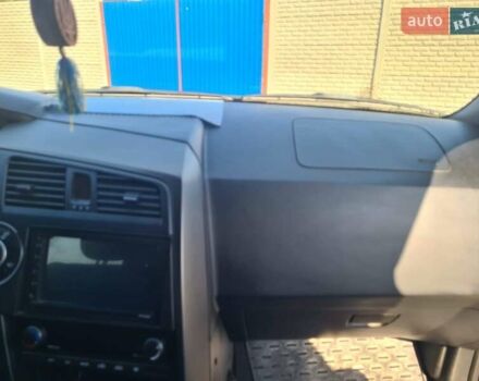 Чорний Cанг Йонг Kyron, об'ємом двигуна 2 л та пробігом 133 тис. км за 10000 $, фото 12 на Automoto.ua