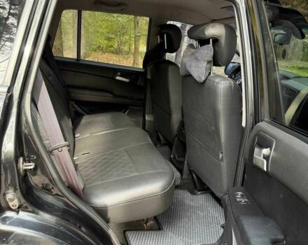 Черный Cанг Йонг Кирон, объемом двигателя 2 л и пробегом 150 тыс. км за 8700 $, фото 11 на Automoto.ua