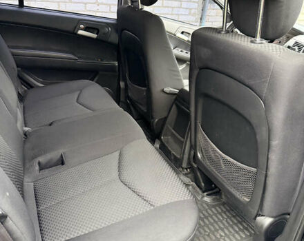 Чорний Cанг Йонг Kyron, об'ємом двигуна 2.3 л та пробігом 113 тис. км за 7500 $, фото 21 на Automoto.ua