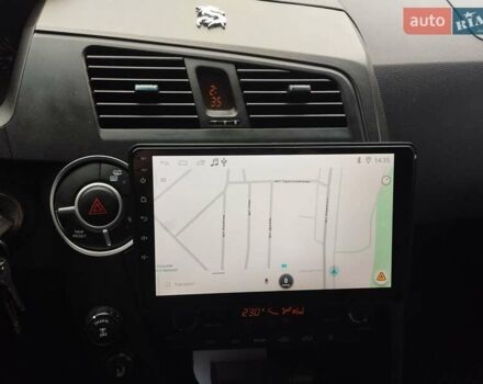 Cанг Йонг Kyron 2010 у Лубнах на Automoto.ua Чорний Cанг Йонг Kyron, об'ємом двигуна 2 л та пробігом 142 тис. км за 8600 $, фото 4 на Automoto.ua