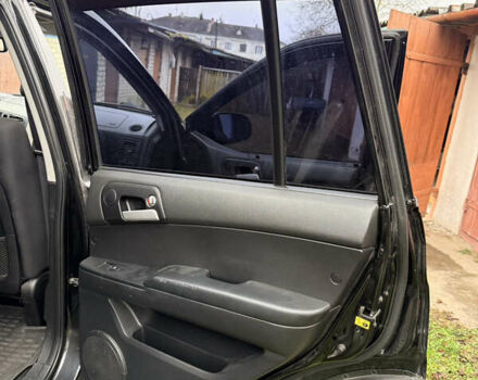 Чорний Cанг Йонг Kyron, об'ємом двигуна 2.3 л та пробігом 113 тис. км за 7500 $, фото 20 на Automoto.ua