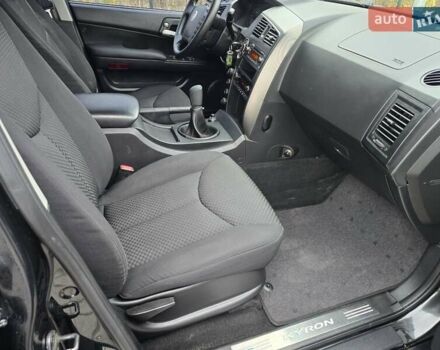 Чорний Cанг Йонг Kyron, об'ємом двигуна 2 л та пробігом 114 тис. км за 8000 $, фото 10 на Automoto.ua