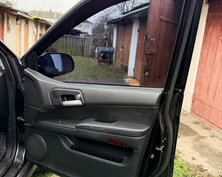 Чорний Cанг Йонг Kyron, об'ємом двигуна 2.3 л та пробігом 113 тис. км за 7500 $, фото 19 на Automoto.ua