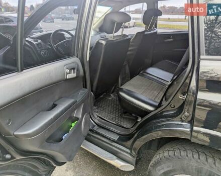 Черный Cанг Йонг Кирон, объемом двигателя 2 л и пробегом 155 тыс. км за 8000 $, фото 5 на Automoto.ua