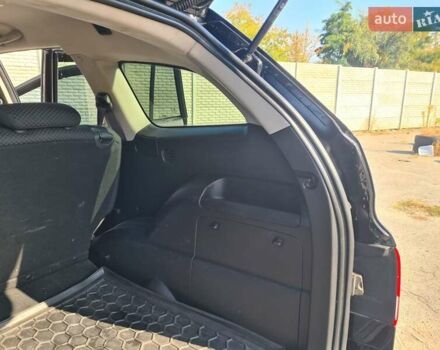 Чорний Cанг Йонг Kyron, об'ємом двигуна 2 л та пробігом 133 тис. км за 10000 $, фото 29 на Automoto.ua