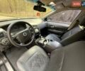 Черный Cанг Йонг Кирон, объемом двигателя 2 л и пробегом 150 тыс. км за 8300 $, фото 17 на Automoto.ua