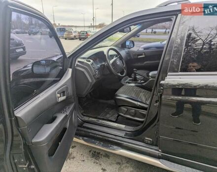 Черный Cанг Йонг Кирон, объемом двигателя 2 л и пробегом 155 тыс. км за 8000 $, фото 4 на Automoto.ua