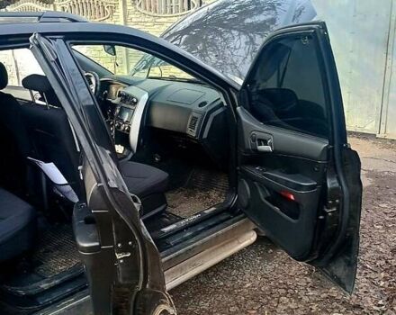 Чорний Cанг Йонг Kyron, об'ємом двигуна 2.3 л та пробігом 162 тис. км за 6500 $, фото 6 на Automoto.ua