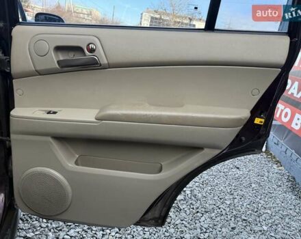 Фіолетовий Cанг Йонг Kyron, об'ємом двигуна 2 л та пробігом 337 тис. км за 5350 $, фото 15 на Automoto.ua