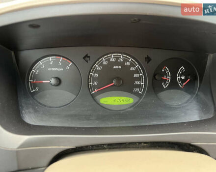 Коричневый Cанг Йонг Кирон, объемом двигателя 2 л и пробегом 310 тыс. км за 3700 $, фото 20 на Automoto.ua