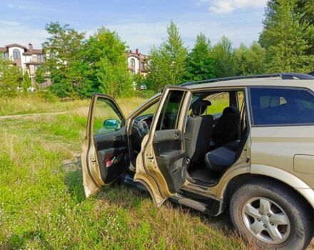 Желтый Cанг Йонг Кирон, объемом двигателя 2 л и пробегом 92 тыс. км за 7000 $, фото 2 на Automoto.ua